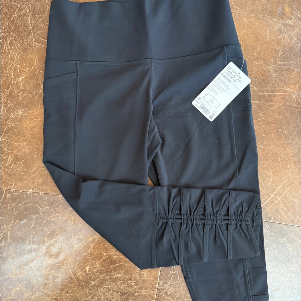 Athleta Black Leggings with Ruched Hem and Side Pockets